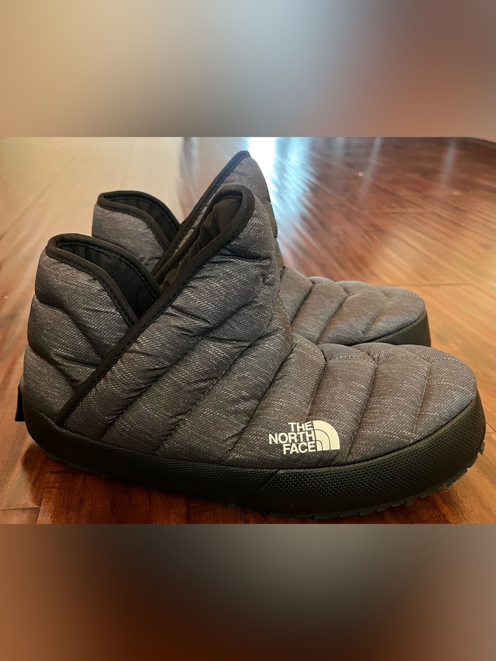 The North Face THERMOBALL
Traction Bootie Gray Quilted Slip-On Puffer Bootie